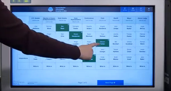 Voter touching screen to make selection.